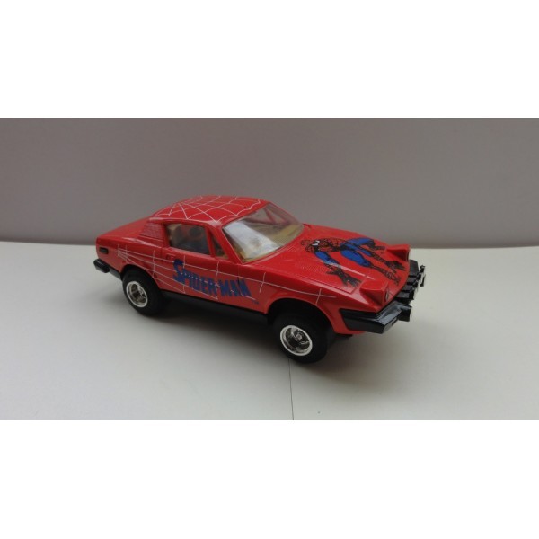 TRIUMPH TR7 SPIDERMAN ROUGE SCALEXTRIC RÉF C322